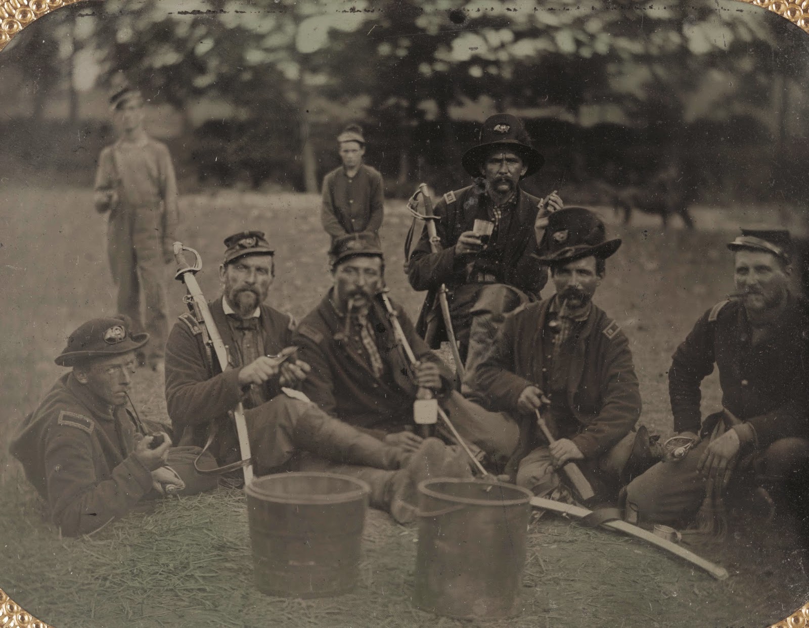 Tintype-portrait-of-a-group-of-Union-officers-of-the-the-45th-Ohio-Volunteer-Infantry-Regiment-smoking-pipes-and-cigars-and-drinking-wine-during-the-Civil-War..jpg