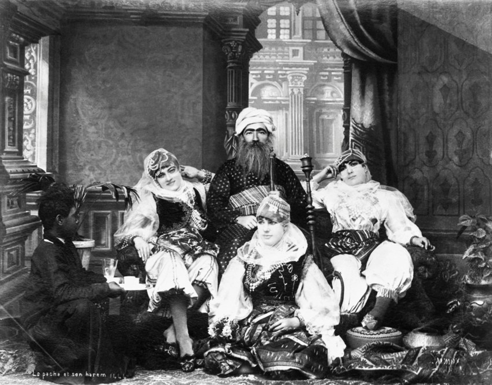 https://www.thecannachronicles.com/wp-content/uploads/2019/05/pasha-and-harem-port-said-egypt-1885-1.jpg